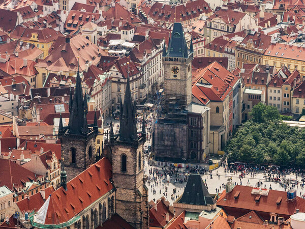 Aerial view on Prague City, Czech Republic. Panoramic view from airplane. Aerial view of Prague. The red roofs of Prague, Kostel Panny Marie pred Tynem, Tynsky temple. Prague..