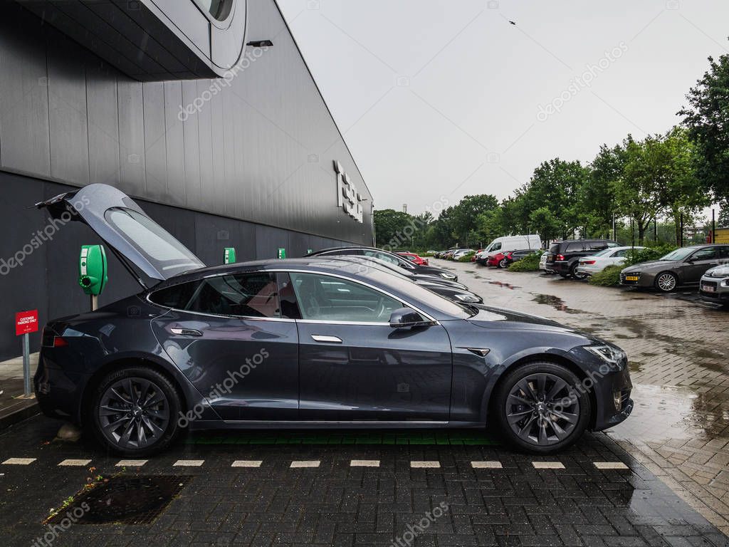 TILBURG, NETHERLANDS - MAY 31, 2018: New Tesla car Model S 100D before factory TESLA TILBURG.. Tesla Motors Assembly Plant in Tilburg, Netherlands. Tesla Model S 100D.
