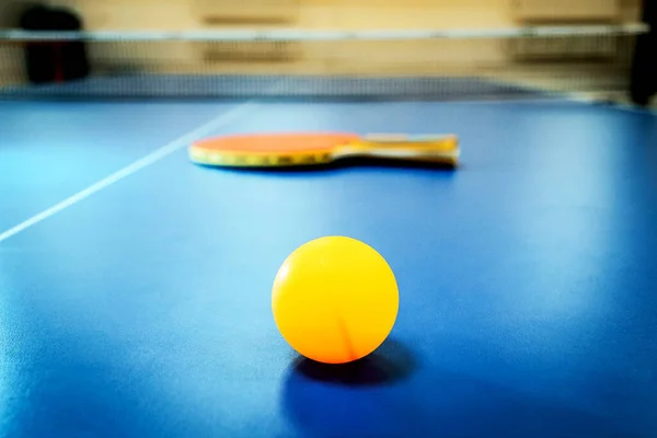 Ping pong ball on a tennis table