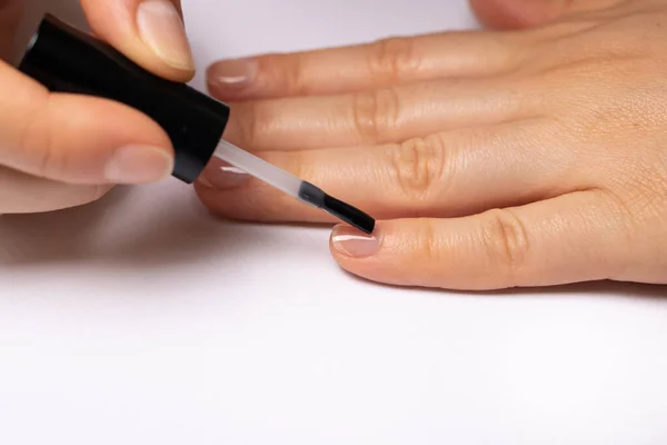 Woman Covers Her Nails Rubber Base Gel Polish Manicure Home — Stock Photo, Image