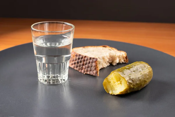 Glass with vodka, sake, pickles and bread. Snack and alcohol.. — Stock Image Glass Vodka Sake Pickles Bread Snack Alcohol Stock Picture