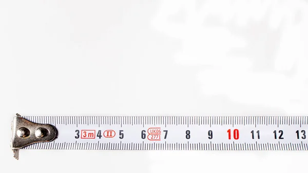 Měřící Páska Čísly Centimetrů Bílém Pozadí Stavební Nástroje — Stock fotografie