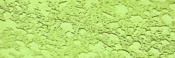 Duvarda dekoratif alçı var. Renk yeşil desen arkaplanı.