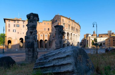 View of colossal Roman ruins with the theater of Marcello, ruins of the temple of Apollo in the Campo Marzio area known as Circo Flaminio between the Tiber river and the Capitoline Hill. Rome Italy. clipart
