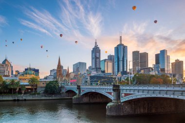 Melbourne city skyline at twilight in Australia clipart