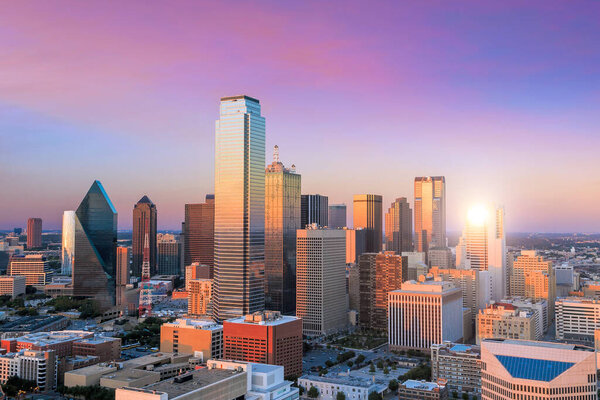 Dallas, Texas cityscape with blue sky at sunset, Texas