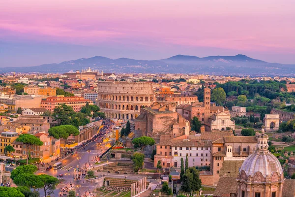 Top view of  Rome city skyline with Colosseum from Castel Sant'Angelo, Italy.