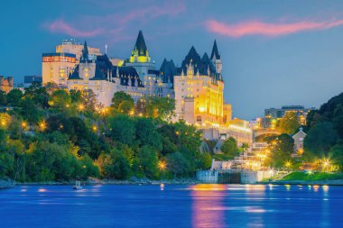 Ottawa city skyline and Parliament Hill in Ontario, Canada at twilight