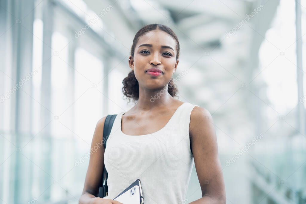 Portrait of an attractive young business woman with a smiling face