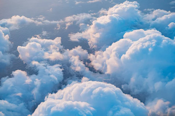 View of the sea and clouds seen from a passenger plane