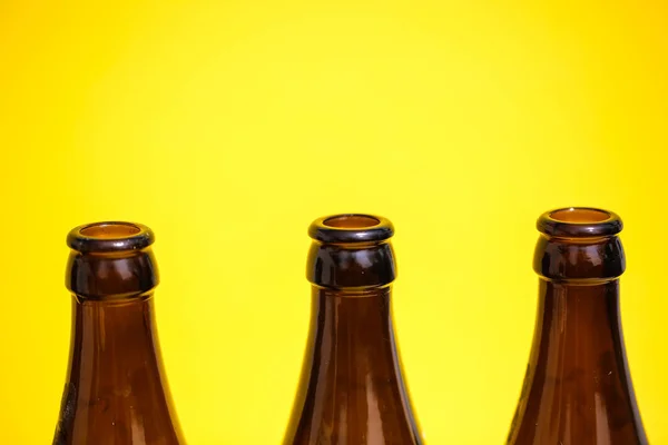 beer bottles on yellow background, fathers day