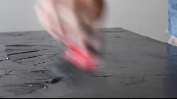水平面にパテを塗布する工程 — ストック動画