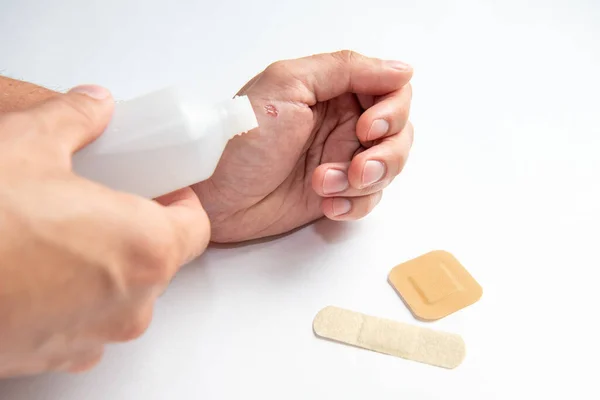 Disinfecting Wound Hand Applying Patch — Stock Photo, Image