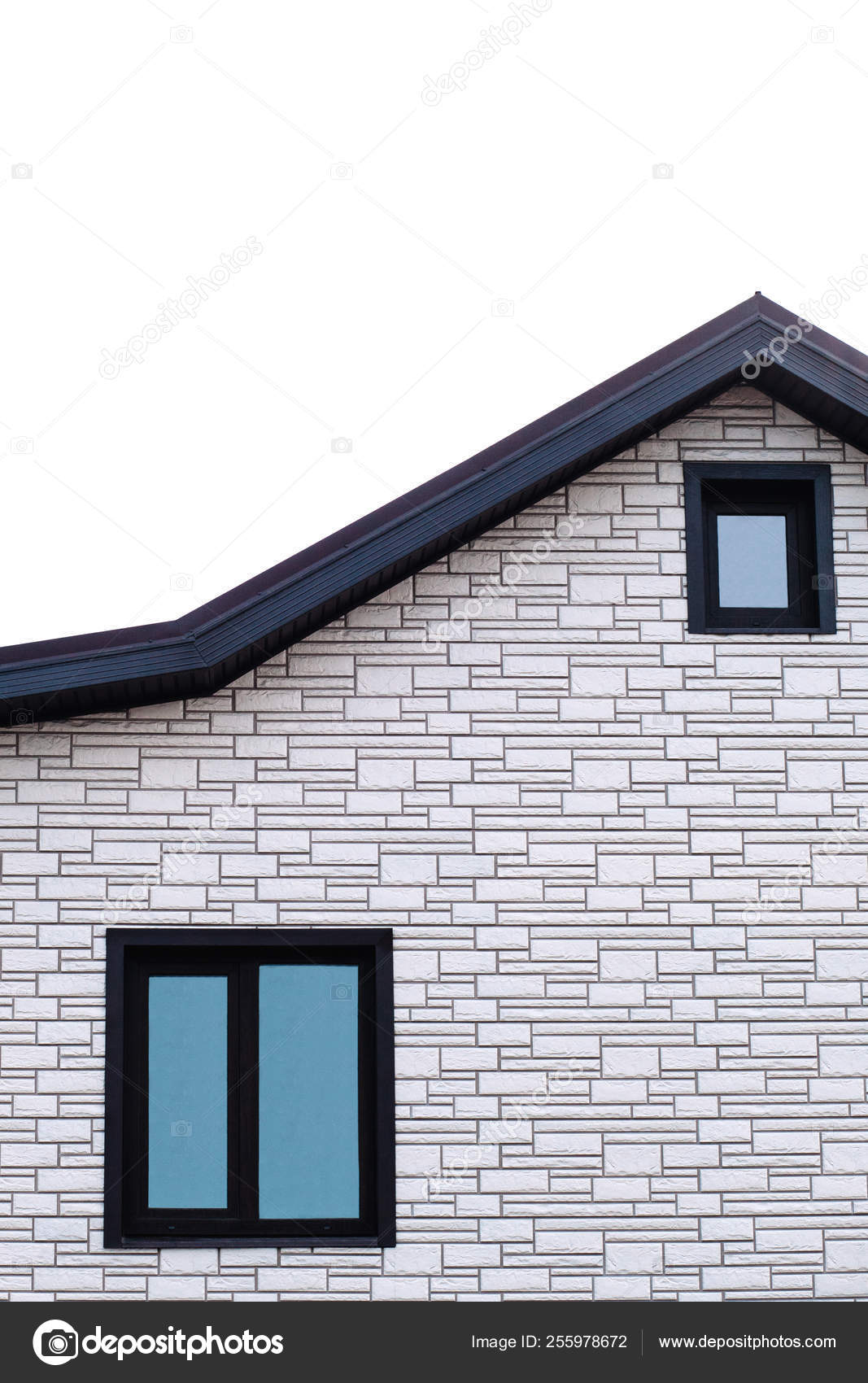Facade Of A House With A Roof And Windows Dormer Windows On A
