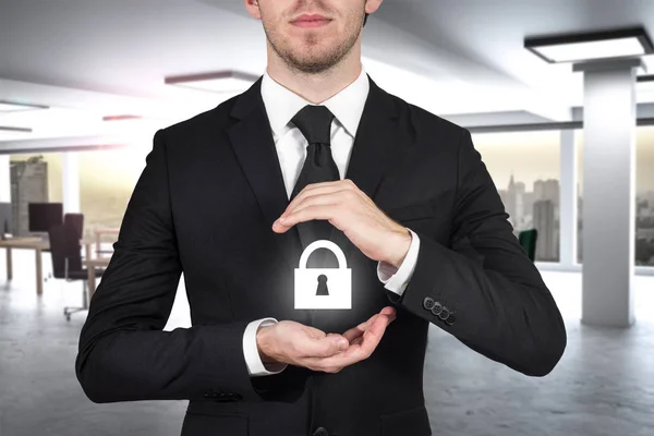 Businessman Large Modern Office Protecting Lock Symbol His Hands — Stock Photo, Image