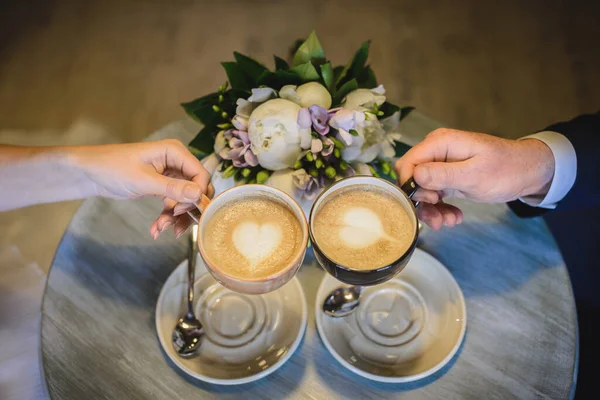 Two Cups Coffee Hands Man Woman Raised Table Background Beautiful Royalty Free Stock Images