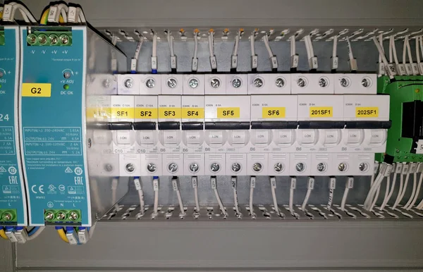Industrial electrical cabinet with circuit breakers, electrical components, industrial voltage power supply, Selective focus