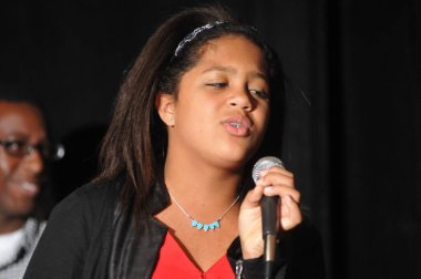 Yargıç Glenda Hatchett 22 Ekim 2014 'te Orlando Florida' daki İnanç Sempozyumu sırasında konuştu.  