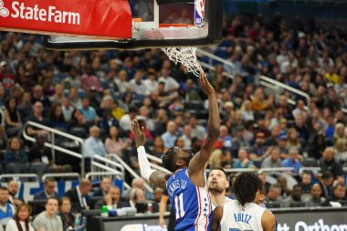 Orlando Magic 27 Aralık 2019 Cuma günü Orlando, Florida 'daki Amway Arena' da Philadelphia 76ers 'a ev sahipliği yapıyor..