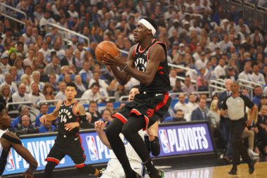 Orlando Magic Hosts the Toronto Rapters during the NBA Playoff Round 1 at the Amway Arena in Orlando Florida on Friday April 19, 2019 clipart