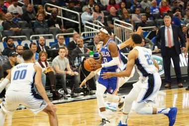 Orlando Magic 27 Aralık 2019 Cuma günü Orlando, Florida 'daki Amway Arena' da Philadelphia 76ers 'a ev sahipliği yapıyor..