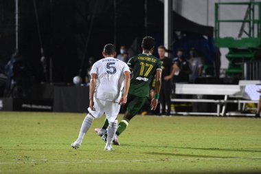 Los Angeles Galaksisi, 14 Temmuz 2020 'de Orlando Florida ABD' deki ESPN Vahşi Spor Dünyası 'nda düzenlenen MLS Sırt Turnuvası sırasında Portland Timbers ile karşı karşıya geldi.