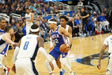 Orlando Magic 27 Aralık 2019 Cuma günü Orlando, Florida 'daki Amway Arena' da Philadelphia 76ers 'a ev sahipliği yapıyor..