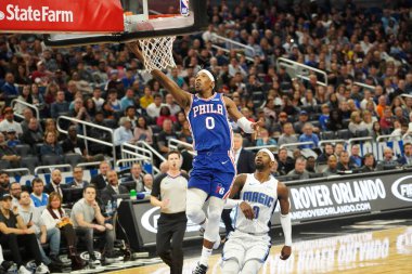 Orlando Magic 27 Aralık 2019 Cuma günü Orlando, Florida 'daki Amway Arena' da Philadelphia 76ers 'a ev sahipliği yapıyor..