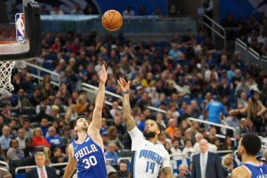 Orlando Magic 27 Aralık 2019 Cuma günü Orlando, Florida 'daki Amway Arena' da Philadelphia 76ers 'a ev sahipliği yapıyor..