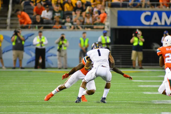 West Virginia Mountaineers Enfrentam Miami Hurricanes Durante 71St Russell Bowl — Fotografia de Stock