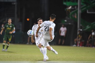 Los Angeles Galaksisi, 14 Temmuz 2020 'de Orlando Florida ABD' deki ESPN Vahşi Spor Dünyası 'nda düzenlenen MLS Sırt Turnuvası sırasında Portland Timbers ile karşı karşıya geldi. 