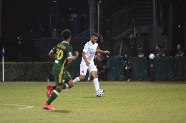 Los Angeles Galaksisi, 14 Temmuz 2020 'de Orlando Florida ABD' deki ESPN Vahşi Spor Dünyası 'nda düzenlenen MLS Sırt Turnuvası sırasında Portland Timbers ile karşı karşıya geldi..