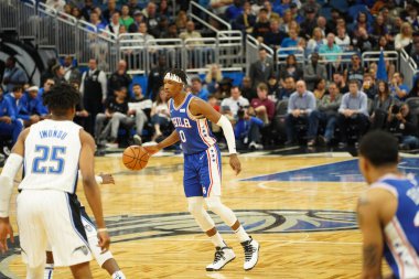 Orlando Magic 27 Aralık 2019 Cuma günü Orlando, Florida 'daki Amway Arena' da Philadelphia 76ers 'a ev sahipliği yapıyor..