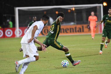 Los Angeles Galaksisi, 14 Temmuz 2020 'de Orlando Florida ABD' deki ESPN Vahşi Spor Dünyası 'nda düzenlenen MLS Sırt Turnuvası sırasında Portland Timbers ile karşı karşıya geldi.