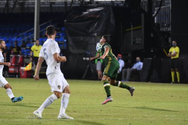 Los Angeles Galaksisi, 14 Temmuz 2020 'de Orlando Florida ABD' deki ESPN Vahşi Spor Dünyası 'nda düzenlenen MLS Sırt Turnuvası sırasında Portland Timbers ile karşı karşıya geldi.