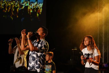 Miel San Marcos grubu 28 Temmuz 2019 tarihinde Tampa Florida 'daki Iglesia de Dios Pentecostal' da sahne almaktadır. 