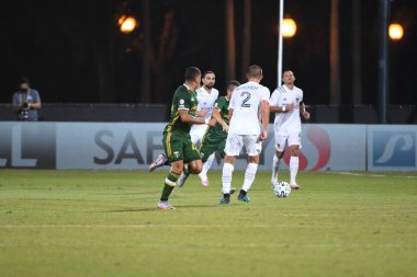 Los Angeles Galaksisi, 14 Temmuz 2020 'de Orlando Florida ABD' deki ESPN Vahşi Spor Dünyası 'nda düzenlenen MLS Sırt Turnuvası sırasında Portland Timbers ile karşı karşıya geldi.