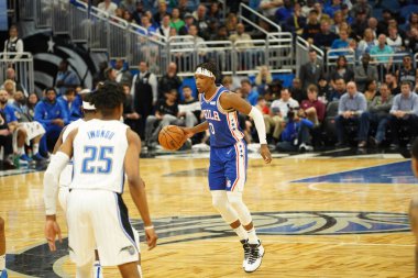 Orlando Magic 27 Aralık 2019 Cuma günü Orlando, Florida 'daki Amway Arena' da Philadelphia 76ers 'a ev sahipliği yapıyor..