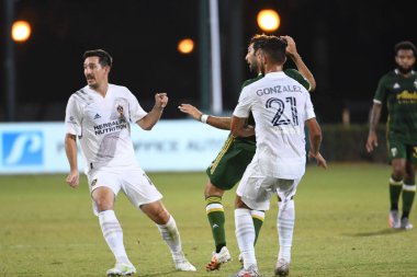 Los Angeles Galaksisi, 14 Temmuz 2020 'de Orlando Florida ABD' deki ESPN Vahşi Spor Dünyası 'nda düzenlenen MLS Sırt Turnuvası sırasında Portland Timbers ile karşı karşıya geldi.