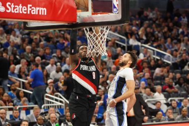 Portland Traillbazers oyuncusu Nassir Little # 9, 2 Mart 2020 tarihinde Orlando Florida 'daki Amway Center' da oynanan maçta smaç basıyor.. 