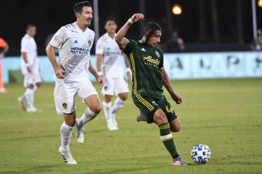 Los Angeles Galaksisi, 14 Temmuz 2020 'de Orlando Florida ABD' deki ESPN Vahşi Spor Dünyası 'nda düzenlenen MLS Sırt Turnuvası sırasında Portland Timbers ile karşı karşıya geldi.