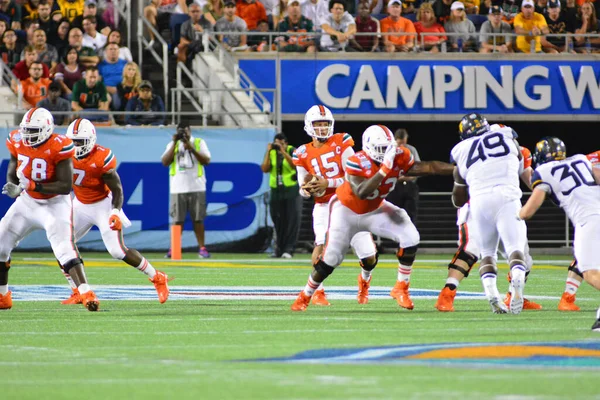 West Virginia Mountaineers Enfrentam Miami Hurricanes Durante 71St Russell Bowl — Fotografia de Stock