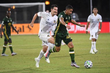 Los Angeles Galaksisi, 14 Temmuz 2020 'de Orlando Florida ABD' deki ESPN Vahşi Spor Dünyası 'nda düzenlenen MLS Sırt Turnuvası sırasında Portland Timbers ile karşı karşıya geldi.