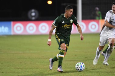 Los Angeles Galaksisi, 14 Temmuz 2020 'de Orlando Florida ABD' deki ESPN Vahşi Spor Dünyası 'nda düzenlenen MLS Sırt Turnuvası sırasında Portland Timbers ile karşı karşıya geldi.