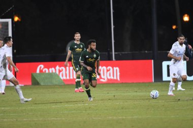 Los Angeles Galaksisi, 14 Temmuz 2020 'de Orlando Florida ABD' deki ESPN Vahşi Spor Dünyası 'nda düzenlenen MLS Sırt Turnuvası sırasında Portland Timbers ile karşı karşıya geldi.
