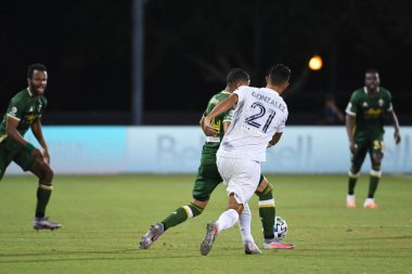 Los Angeles Galaksisi, 14 Temmuz 2020 'de Orlando Florida ABD' deki ESPN Vahşi Spor Dünyası 'nda düzenlenen MLS Sırt Turnuvası sırasında Portland Timbers ile karşı karşıya geldi. 