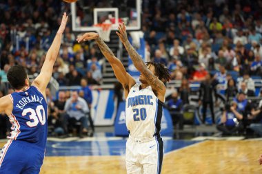 Orlando Magic 27 Aralık 2019 Cuma günü Orlando, Florida 'daki Amway Arena' da Philadelphia 76ers 'a ev sahipliği yapıyor..