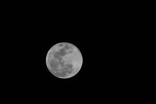 beautiful view of full moon in night sky