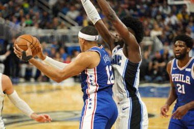 Orlando Magic 27 Aralık 2019 Cuma günü Orlando, Florida 'daki Amway Arena' da Philadelphia 76ers 'a ev sahipliği yapıyor..