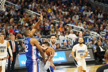 Orlando Magic 27 Aralık 2019 Cuma günü Orlando, Florida 'daki Amway Arena' da Philadelphia 76ers 'a ev sahipliği yapıyor..